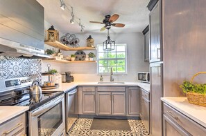 Fridge, microwave, stovetop, dishwasher - 'Tropical Landing' Stuart Home w/ Pool + Grill! (Stuart)