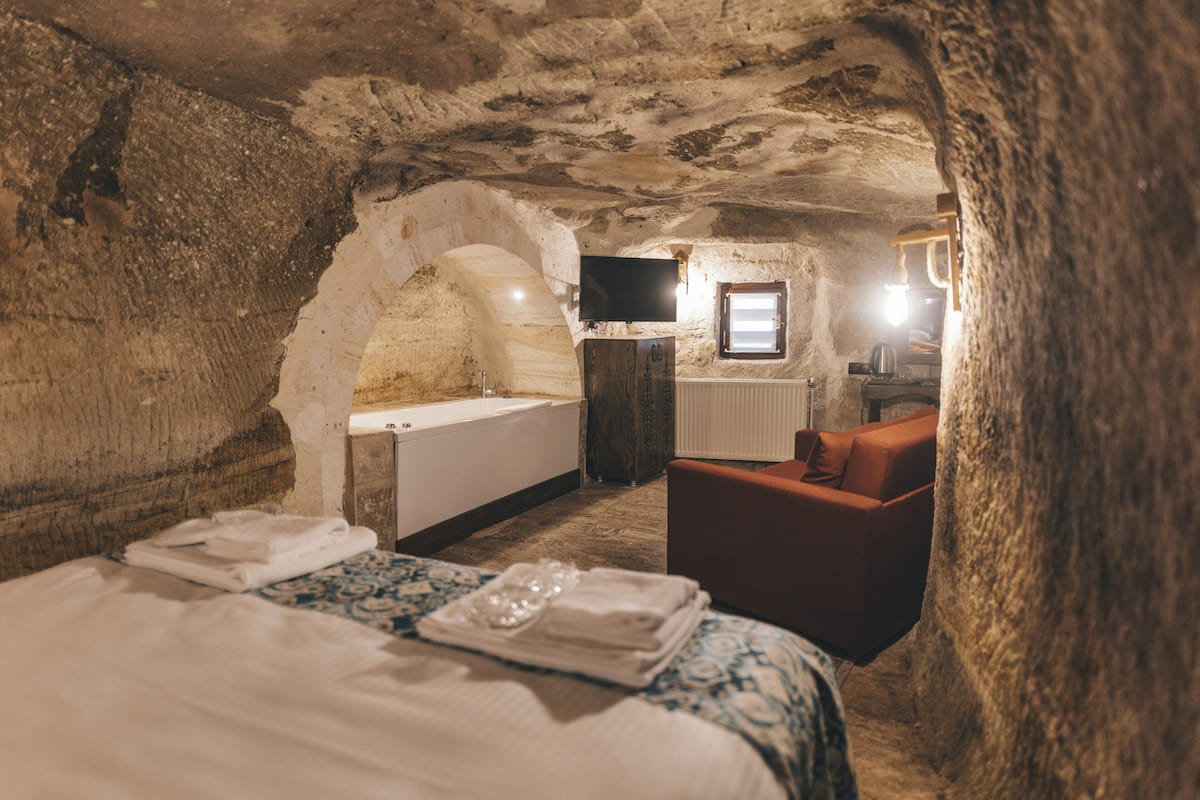 Cave Jacuzzi Deluxe room-4 | 1 bedroom, premium bedding, Select Comfort beds, individually decorated