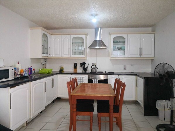 Apartment | Private kitchen | Fridge, microwave, oven, stovetop - Stunning Views at sky Castles, Ocho Rios (Ocho Rios)