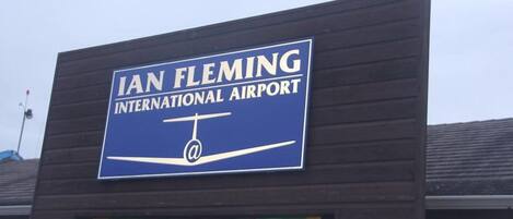 A sign for Ian Fleming International Airport.