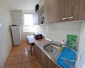 Fridge, microwave, stovetop, coffee/tea maker