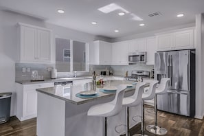 Fridge, microwave, oven, stovetop - Breezin': Pool, Spa, Fire Pit, Foosball and more! (Indio)