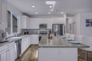 Fridge, microwave, oven, stovetop - Breezin': Pool, Spa, Fire Pit, Foosball and more! (Indio)