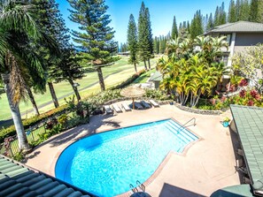 A swimming pool with a view of a golf course and tropical vegetation. - Kapalua Golf Villas | Golf View 2 BR | Car Incl. w/ 6+ Nights | KGV-14V3 by KBM (Lahaina)