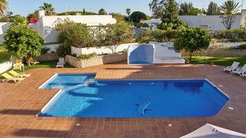 Outdoor pool, open 8:00 AM to 9:00 PM, pool umbrellas, sun loungers