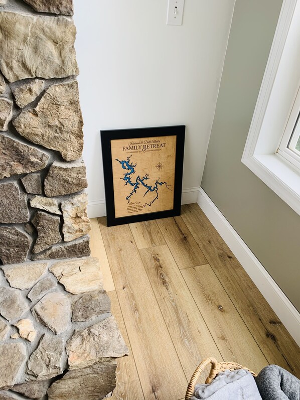 A framed map of a family retreat with a stone wall and wooden flooring. - Amazing view from the Family Lake Retreat (Murphy)