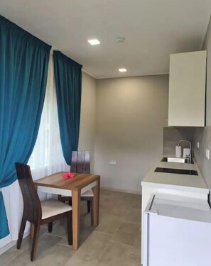 Fridge, oven, electric kettle, toaster