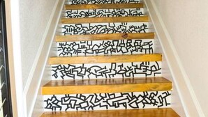 A staircase with wooden steps and white walls. - The Euclid 1925 Bungalow Located in Downtown (St. Petersburg)