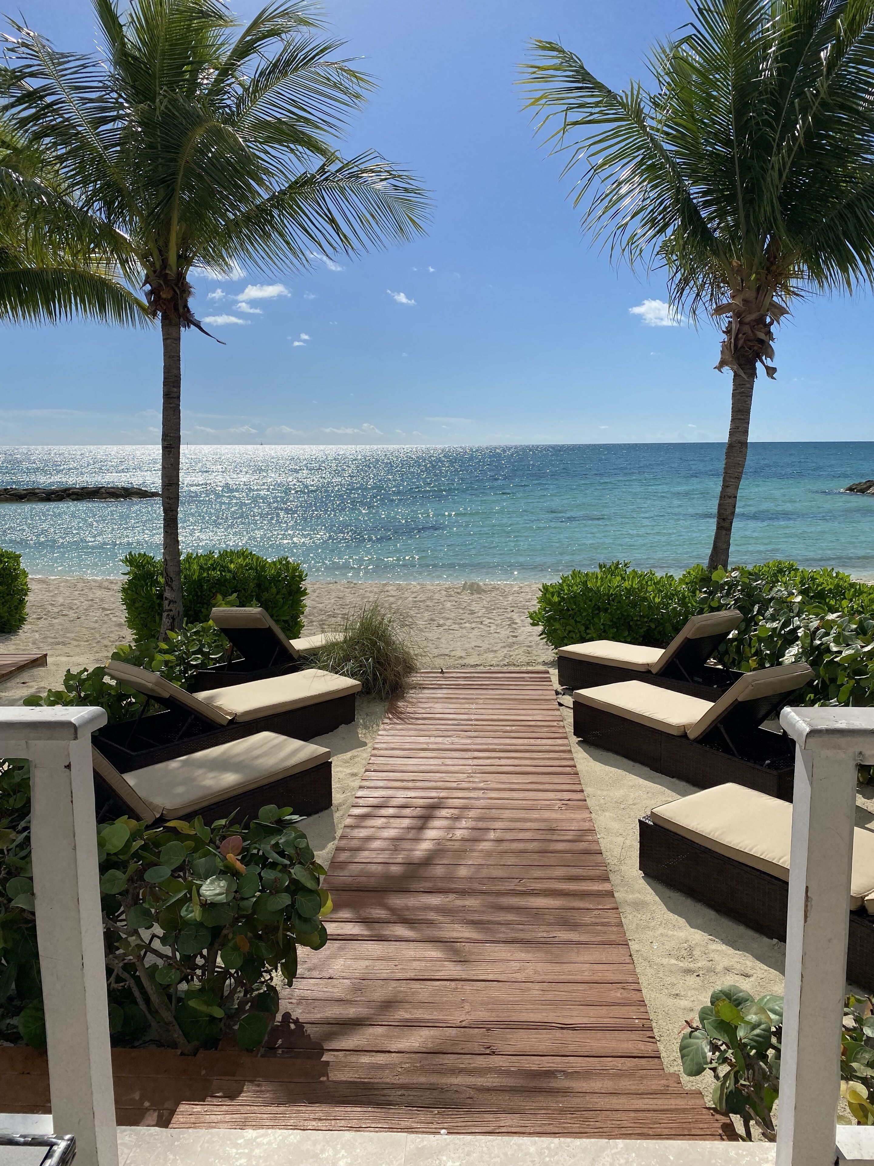 On the beach, sun loungers, beach towels