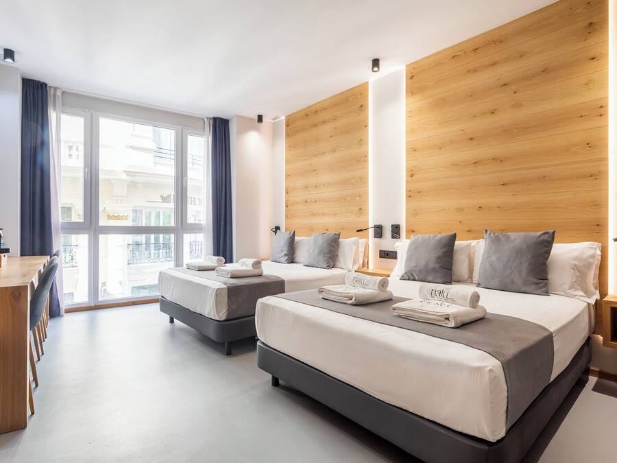 Deluxe Quadruple room, exterior | Premium bedding, down comforters, minibar, in-room safe