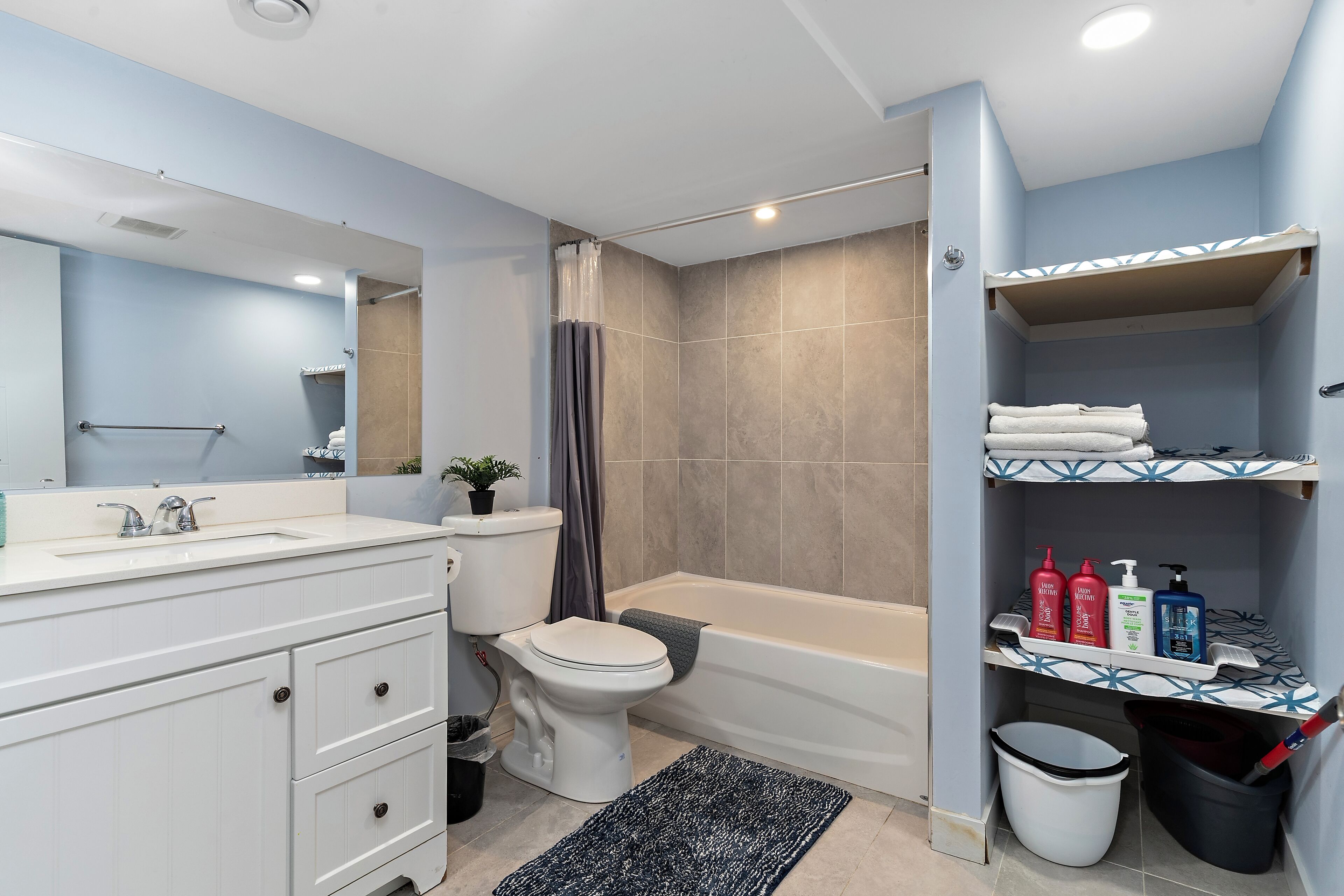 Combined shower/tub, hair dryer, towels, soap