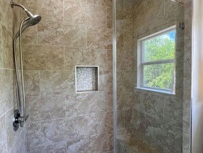 Shower, eco-friendly toiletries, hair dryer, towels