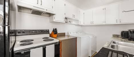 Fridge, stovetop, dining tables