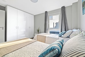 2 chambres, fer et planche à repasser, accès au Wi-Fi (inclus)