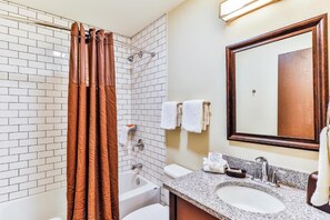 Shower, hair dryer, towels, soap - Studio Suite w/ Kitchenette @ Polynesian Hotel (Wisconsin Dells)