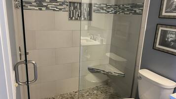 Shower, hair dryer, towels, soap