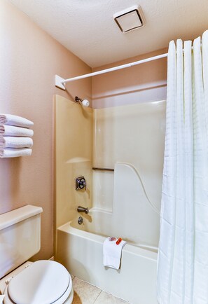 Shower, hair dryer, towels, soap - Comfortable Hotel Room @ Polynesian Hotel (Wisconsin Dells)