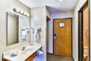Shower, hair dryer, towels, soap - Comfortable Hotel Room @ Polynesian Hotel (Wisconsin Dells)