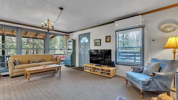 Off site Creekside Cottage 2 story Sleeps 7 | Living area | 55-inch flat-screen TV with cable channels, fireplace