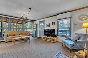 Off site Creekside Cottage 2 story Sleeps 7 | Living area | 55-inch flat-screen TV with cable channels, fireplace - Idyllwild Inn (Idyllwild)