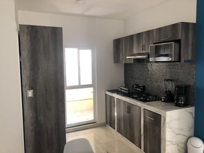 Microondas, horno y parrilla de estufa