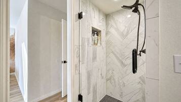 Combined shower/tub, hair dryer, towels, soap