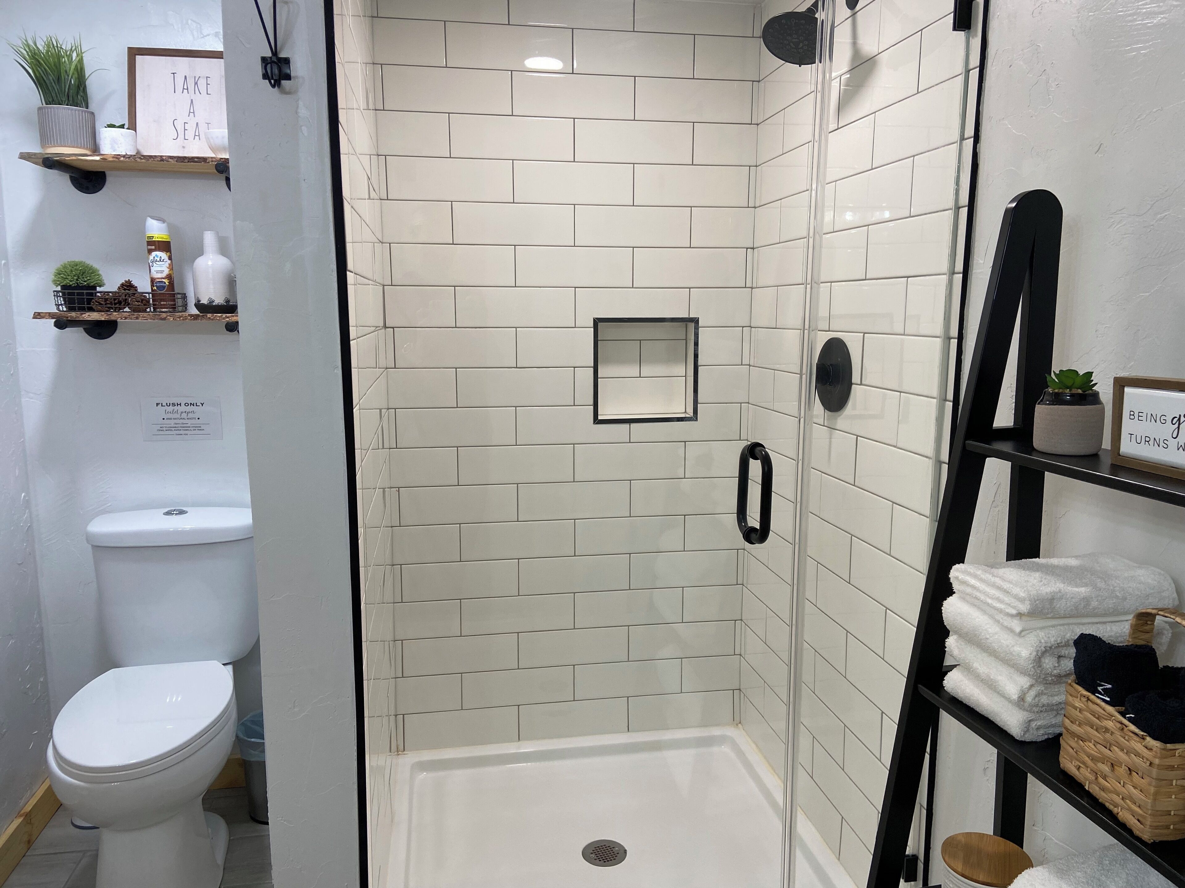 Shower, hair dryer, towels, toilet paper
