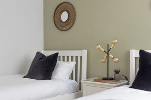 2 bedrooms, desk, iron/ironing board, travel cot