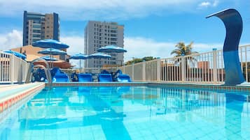 Outdoor pool, pool umbrellas, pool loungers