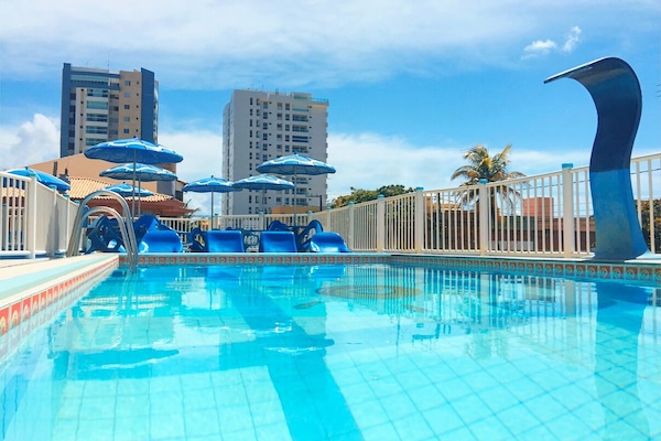 Outdoor pool, pool umbrellas, pool loungers