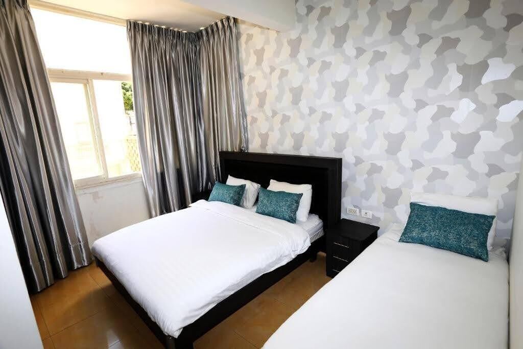 economy twin room | hypo-allergenic bedding, minibar, in-room safe, blackout curtains