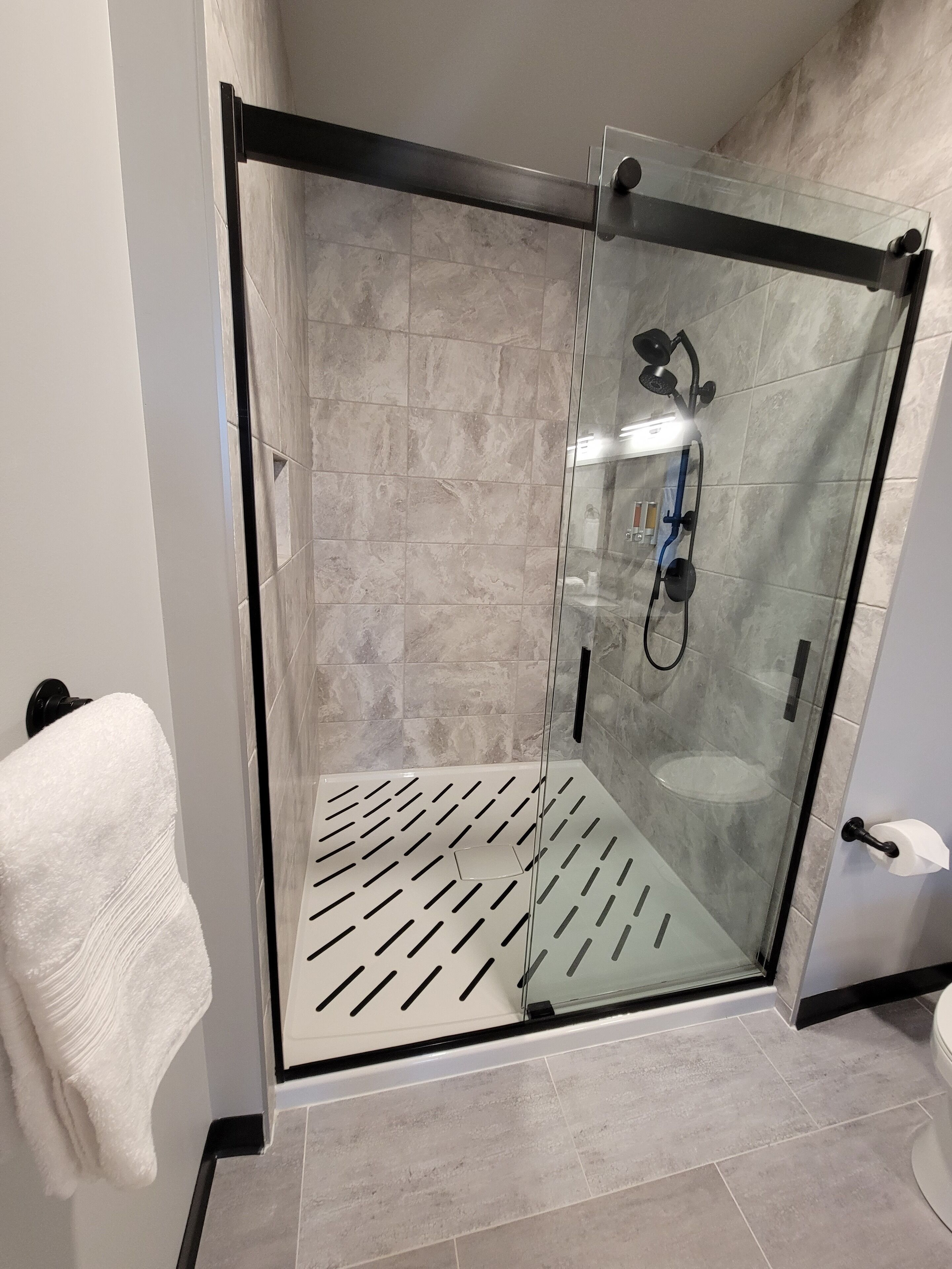 shower, rainfall showerhead, towels