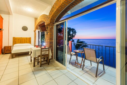 Traditional Sierra Leon Oceanfront Rooms