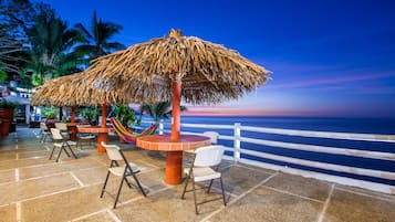 Economy Room, 2 Double Beds, Non Smoking, Sea View | Terrace/patio