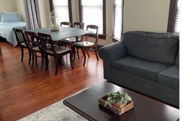 Living room, dining area, and second bedroom.