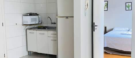 Comfort Apartment, 1 Bedroom | Private kitchen | Mini-fridge, microwave, dishwasher, cookware/dishes/utensils