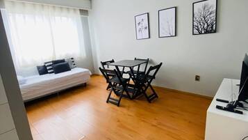 Comfort Apartment, 1 Bedroom | Living area | 32-inch TV with cable channels, Netflix, streaming services