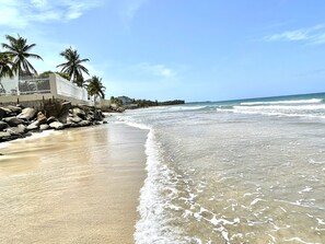 On the beach, sun-loungers, beach towels