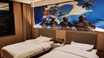 A hotel room with two beds, a large poster on the wall, and a window with curtains.