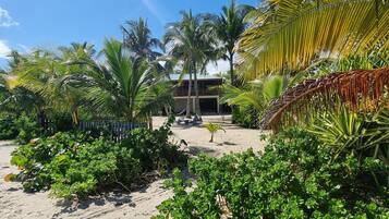 On the beach, sun loungers, beach towels