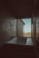 Glass Cabin 2.0, with Hot Tub and Panoramic Views | Baño | Artículos de higiene personal de diseño, secador de pelo y albornoces