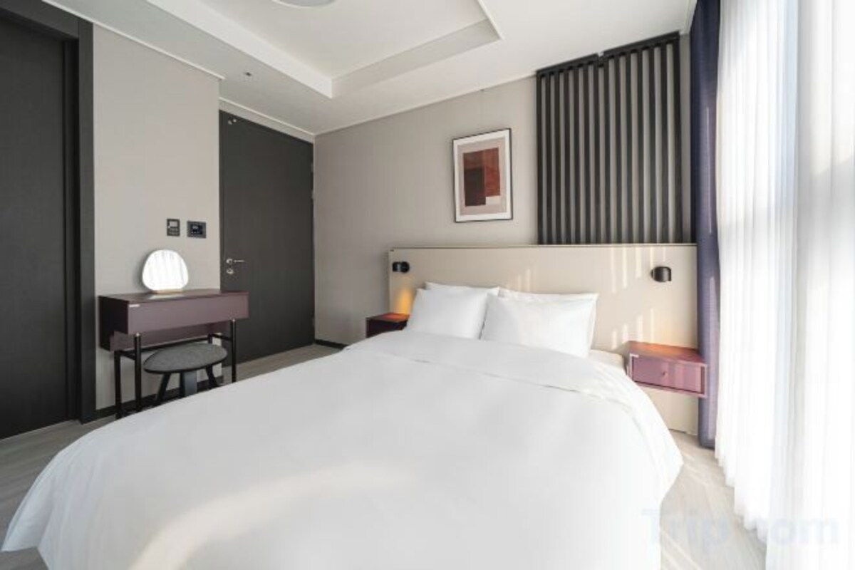 Down duvets, memory-foam beds, laptop workspace, blackout curtains