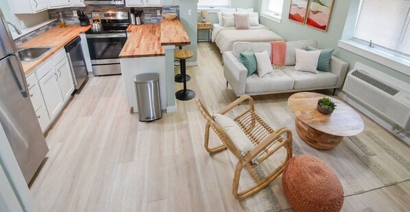 Open living space with sofa and kitchen