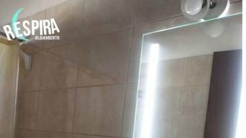 Shower, bidet, towels, soap