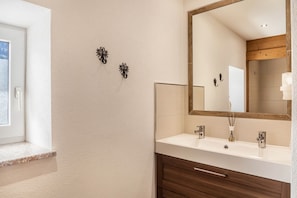 Ducha, secador de pelo