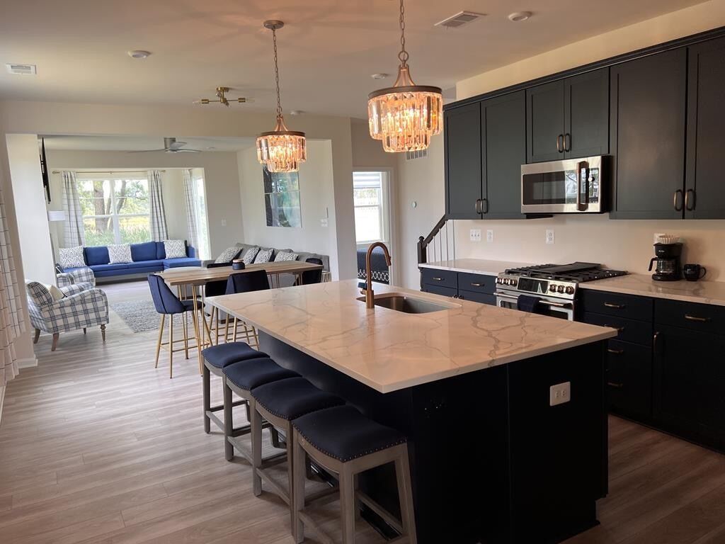 brand new state of the art kitchen with GE Cafe Appliances.