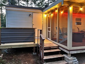 Terrace/patio - Parkmodel cabin w screened porch in campground on bike trail. (Boulder Junction)