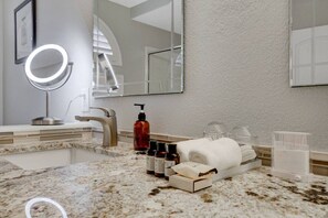 Bathtub, jetted bath, hair dryer, towels