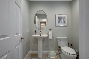 Bathtub, jetted bath, hair dryer, towels