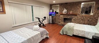 2-12 people 4 bedrooms 6 beds 2 bathroom, free parking, pets friendly